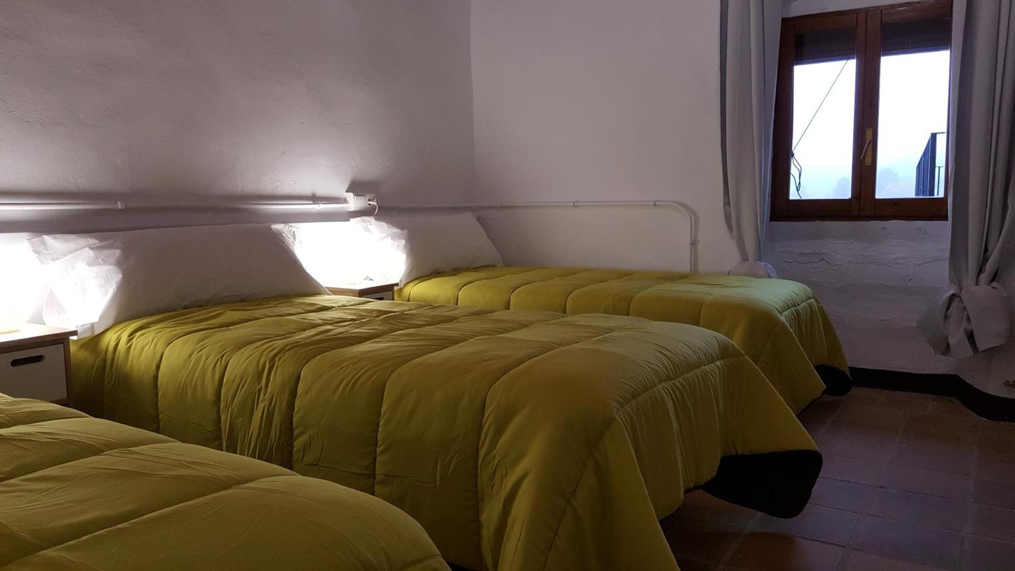 Espai Abadia Argentera Pokoj fotografie
